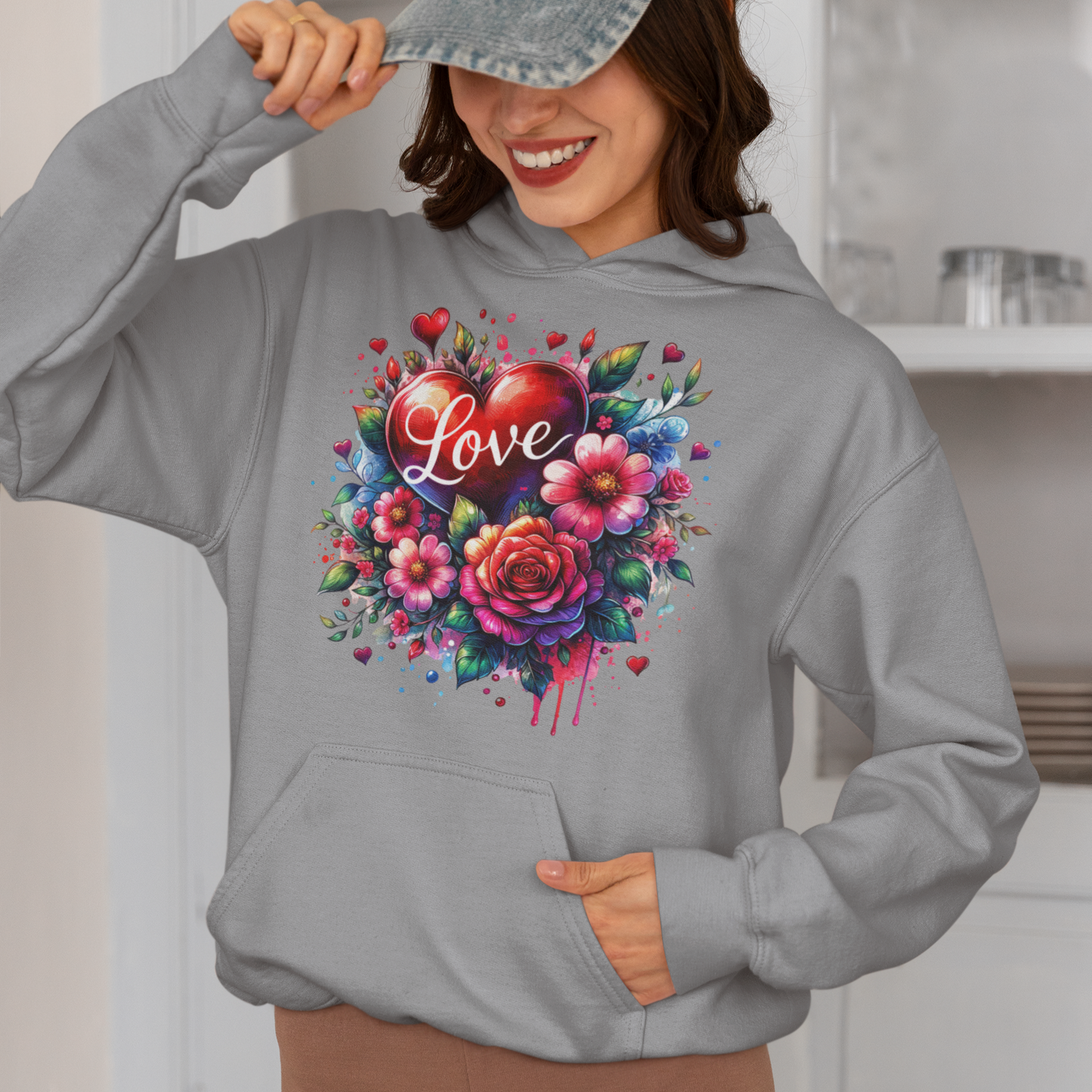 Blooming Love Hoodie with Floral and Watercolor Hearts Design.